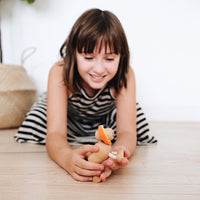 Adorable eco-friendly lion toy crafted from wood and fabric, ideal for sparking imaginative adventures
