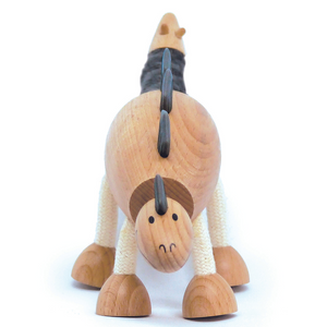 Adorable eco-friendly wooden Stegosaurus dinosaur toy with three horns and a bendy tail, perfect for imaginative play and learning.