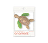 Adorable eco-friendly wooden turtle toy with fabric flippers and a smiling face, perfect for imaginative play and learning.